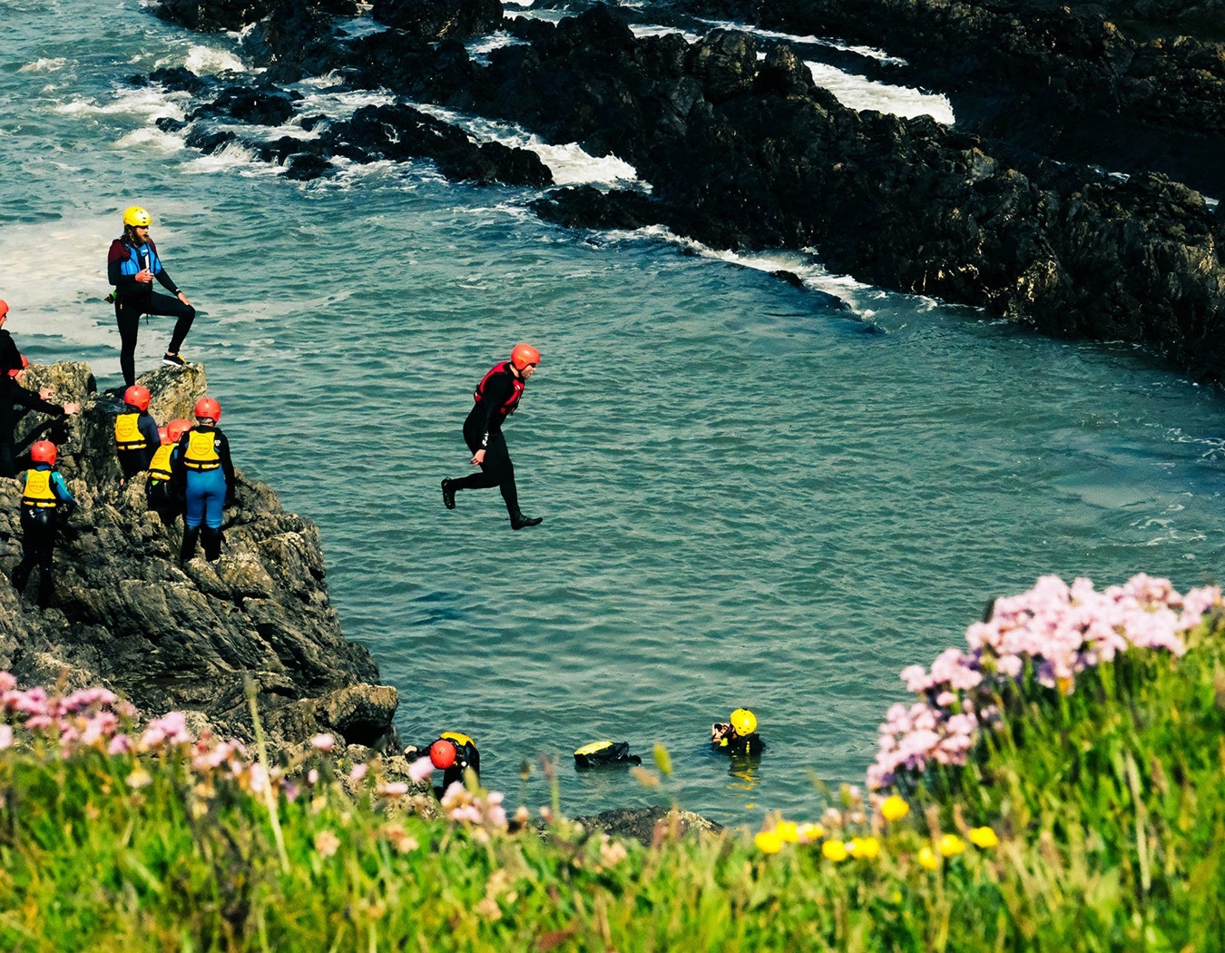 Coasteering and swimming in coastal seawater